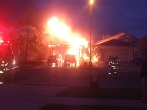 An overnight house fire in southeast Edmonton prompted neighbours in the area to evacuate their home Sat., May 31, 2015. PHOTO SUPPLIED