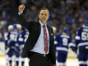 Tampa Bay Lightning coach Jon Cooper celebrates a win over the Montreal Canadiens in Game Six of the Eastern Conference semifinals at Amalie Arena on May 12, 2015 in Tampa. (Mike Carlson/Getty Images/AFP)