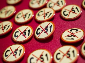Pins handed out during a rally against Bill C-51, the Canadian federal government's proposed anti-terrorism legislation in Vancouver, British Columbia April 18, 2015.  (REUTERS/Ben Nelms)