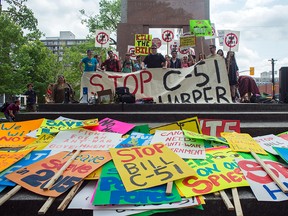 Protesters at the Human Rights Monument on Elgin St. in Ottawa rally against Bill C-51 on May 30, 2015. (DANI-ELLE DUBE/Postmedia Network)