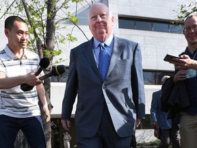 Suspended Senator Mike Duffy leaves the courthouse in Ottawa on May 8, 2015. (Tony Caldwell/Postmedia Network)
