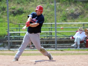 Kingston Ponies' James Hornby striking-out against the Nepean Brewers in Kingston, Ont. on Saturday May 30, 2015. Ponies defeated the Brewers 6-4.  Steph Crosier/Kingston Whig-Standard/Postmedia Network