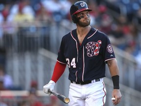 Bryce Harper #34 of the Washington Nationals reacts after striking out in the ninth inning against the Philadelphia Phillies at Nationals Park on May 23, 2015 in Washington, DC. (Patrick Smith/Getty Images/AFP)