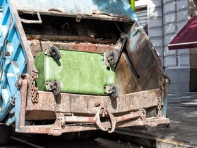 A garbage truck is pictured in this file photo. (Fotolia)