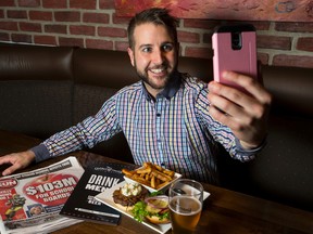 General Manager Kris Anthony poses for a photo at The Underground Tap & Grill for the Edmonton Sun's BurgerFest contest in Edmonton, Alta., on Friday May 29, 2015. Ian Kucerak/Edmonton Sun/Postmedia Network