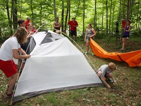 SUBMITTED PHOTO
A team of Scouts from Eastern Ontario, including local kids, now have a Guinness World Record title under their belts. The team of 10 scouts earned the Guinness title of fastest time erecting a four-man tent in one-minute and 58 seconds.