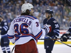 New York Rangers forward Matrs Zuccarello celebrates his goal against the Winnipeg Jets during NHL action at MTS Centre in Winnipeg, Man., on Tues., March 31, 2015. (Kevin King/Winnipeg Sun/Postmedia Network)