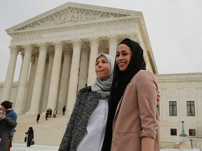 Muslim woman Samantha Elauf stands with her mother Majda outside the U.S. Supreme Court in Washington, in this February 25, 2015 file photo. The Supreme Court on June 1, 2015 ruled in favour of Elauf, who was denied a sales job in 2008 at an Abercrombie Kids store in Tulsa when she was 17. REUTERS/Jim Bourg/Files