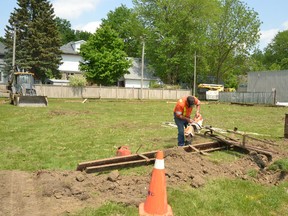 West Perth municipal staff, such as Ian McCoy, were preparing the Friendship Centre lawn so it can become temporary parking during the completion of the municipality's streetscape project in downtown Mitchell this summer. GALEN SIMMONS/MITCHELL ADVOCATE