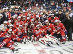 Oshawa Generals players celebrate their 2-1 overtime victory over the Kelowna Rockets in the Memorial Cup fi nal at the Colisee Pepsi in Quebec City on Sunday night. (Reuters)