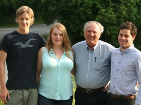 FILE PHOTO - Caleb Cober, Gina Aicken and Tillsonburg's Brandon Lawler (far right) were recipients of the 2014 Leighton and Betty Brown Conservation Scholarship. Tom Haskett, chair of the Lee Brown Marsh Management Committee, made the presentation.