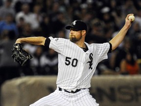 Chicago White Sox starting pitcher John Danks (50) delivers in the first inning of their game against the Kansas City Royals at U.S Cellular Field.  (Matt Marton-USA TODAY Sports)
