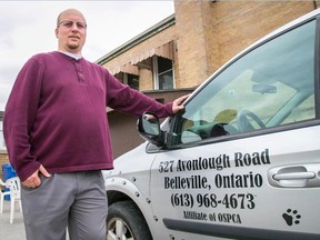 Frank Rockett, Quinte Humane Society executive director, stands beside the official Quinte Humane Society van in Belleville. 
Tim Miller/The Intelligencer