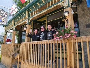 Deborah Hunter, her husband Rich Hunter and her son Tyler Patterson are celebrate the 10th anniversary of their business, the King Edward Pub and Restaurant in Ilderton. (DEREK RUTTAN, The London Free Press)