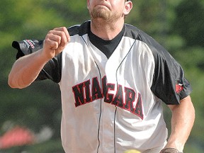 Niagara Snappers pitcher Ian Wallwork throws to a batter during the championship game of a fastball tournament in Woodstock in 2014. Wallwork, of Picton, now pitches for the Kingston Axemen. (Postmedia Network file photo)