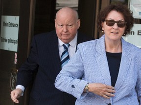 Senator Mike Duffy departs the Ottawa Courthouse with his wife Heather in Ottawa, Ont. on Monday June 1, 2015. 
Errol McGihon/Ottawa Sun