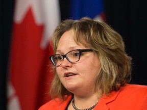 Alberta Health Minister Sarah Hoffman discusses a new restrictions on menthol tobacco at the Alberta Legislature, in Edmonton Alta. on Sunday May 31, 2015. The decision removes an exemption for menthol flavoured tobacco from a flavoured tobacco ban starting June 1 set in motion by former health minister Stephen Mandel. David Bloom/Edmonton Sun/Postmedia Network