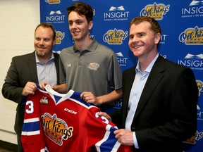 Goalie Alec Dillon is flanked by Oil Kings head coach Steve Hamilton, left, and general manager Randy Hansch (Tom Braid, Edmonton Sun).