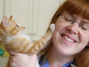 Gino Donato/The Sudbury Star
Veterinarian Nicole Baran and her cat Francis.