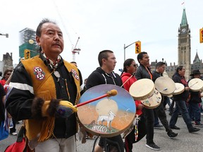 Thousands of people marched from Gatineau to Ottawa city hall in Ottawa, Ont., on May 31, 2015. The march was part of the closing ceremonies of the Truth and Reconciliation Commission which took place Sunday in Ottawa. (Tony Caldwell/Postmedia Network)