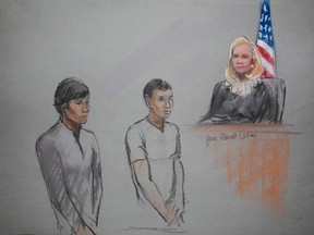 Friends of the Boston bomber and defendants Dias Kadyrbayev, left, and Azamat Tazhayakov are pictured in a courtroom sketch on May 1, 2013. Kadyrbayev was sentenced to six years in prison for obstruction of justice on Tuesday. REUTERS/Jane Flavell Collins