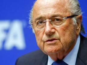 FIFA president Sepp Blatter announced at a news conference that he will quit his post days after winning re-election. (Arnd Wiegmann/Reuters/Files)