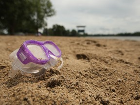 Only a handful of people were at Mooney's Bay on a chilly summer day in Ottawa, Ont., on July 30, 2014. The Weather Network's forecast is saying that much of Canada can expect a repeat of last summer's weather in 2015. (DOUG HEMPSTEAD/Postmedia Network)