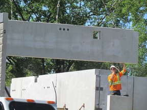 Work continues on a $5 million, six-storey hotel project on Venetian Boulevard on Tuesday June 2, 2015 in Point Edward, Ont. Construction of the 92-room Hampton Inn is expected to be completed this year. (Paul Morden, The Observer)