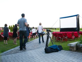 People arrive for the first screening at the Niagara Intergrated Film Festival of the world premiere of Re-Strung by director Mike Enns at Trius Winery at Hillebrand on Thursday, June 19, 2014. Julie Jocsak/Postmedia Network