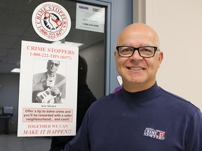Sarnia Lambton Crime Stoppers coordinator Todd Monaghan stands outside the agency's Sarnia office at the city's police station. The ex-OPP officer is continuing work with Crime Stoppers as a civilian after retiring from police work this spring. (Tyler Kula, The Observer)