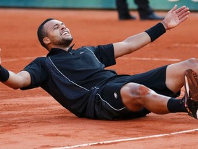 Jo-Wilfried Tsonga celebrates after defeating Kei Nishikori during their French Open quarterfinal match at Roland Garros stadium in Paris June 2, 2015. (REUTERS/Pascal Rossignol)