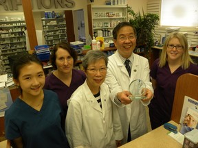 Ernst Kuglin/The Intelligencer
Trenton pharmacist William Chuen was named winner of the 2015 patient impact award by the Ontario Pharmacists Association (OPA). The award was presented in Ottawa May 28, at the 2015 Canadian Pharmacists Conference and co-hosted by OPA. Left to right are the Trenton Pharmacy staff Sera Lee, Susan Clarke, Antonia and Bill Chuen and Katherine McCann. Missing from the picture is Lori Rappel.