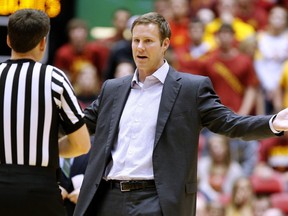 Coach Fred Hoiberg of the Iowa State Cyclones argues a call by the referee during NCAA play against the Kansas State Wildcats at Hilton Coliseum on January 20, 2015 in Ames, Iowa. (David Purdy/Getty Images/AFP)