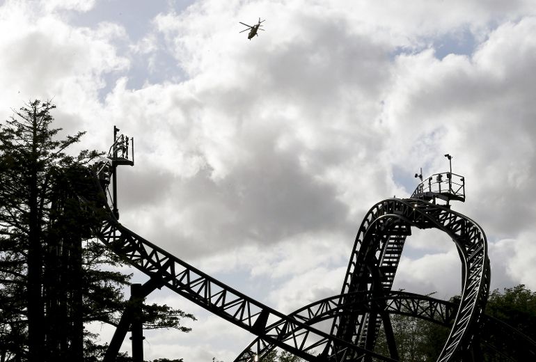 Four seriously hurt after rollercoaster cars crash at British theme