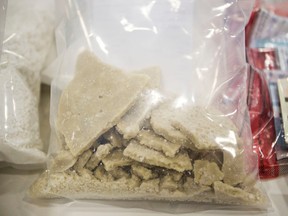 Crack cocaine is seen during a press conference at Alberta Law Enforcement Response Teams (ALERT) headquarters after a series of four search warrants were executed as a targeted investigation into a cocaine supply group in Edmonton, Alta. on Wednesday, April 22, 2015. ALERT's seizure included seven kilograms of cocaine, 11.4 kilograms of buffing agent Phenacetin, 567 grams of MDMA, 10 kilograms of marijuana, three prohibited weapons, four vehicles and $6,365 cash proceeds of crime. Codie McLachlan/Edmonton Sun