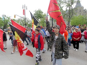 A group of people marched from the University of Winnipeg to Thunderbird House in Winnipeg, after hearing the findings of the Truth and Reconciliation Commission's findings.  Tuesday, June 02, 2015. Chris Procaylo/Winnipeg Sun/Postmedia Network