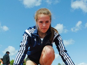 Sophia Skorenky in the starting blocks at practice at CaraCo Field on Tuesday. (Julia McKay/The Whig-Standard)