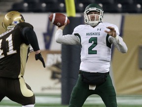 University of Saskatchewan quarterback Drew Burko, seen here in action in the 2013 Canada West semifinal, has two more years of CIS eligibility. (kevin King, Postmedia Network)