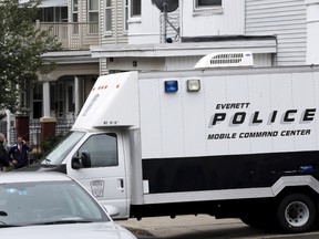 Law enforcement officials are gathered on a residential street in Everett, Massachusetts June 2, 2015 in connection to a man shot dead by law enforcement in Boston after coming at them with a large knife when they tried to question him as part of a terrorism-related investigation, authorities said.  The 26-year-old man, identified as Usaamah Rahim, brandished a knife and advanced on officers working with the Joint Terrorism Task Force who initially tried to retreat before opening fire, Boston Police Superintendent William Evans told
reporters.    REUTERS/Brian Snyder