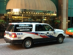 Police were called to the Cambridge Suites Hotel on Richmond St. E. around 5:50 a.m. on Wednesday, June 3, 2015. (MICHAEL PEAKE/Toronto Sun)