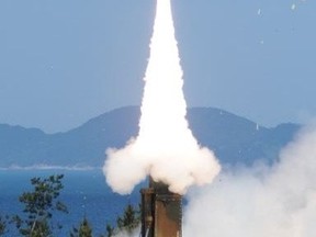 A ballistic missile is launched from a firing range of the state-run Agency for Defense Development in this picture provided by Defense Ministry and released by Yonhap, in Taean, South Korea, June 3, 2015. South Korea on Wednesday test-launched a new ballistic missile that can hit all of North Korea, the president's office said, developed under a new agreement with the United States that lets Seoul extend the weapon's range to up to 800 km (500 miles).  REUTERS/Defense Ministry/Yonhap