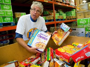 Jay Stanford, the city’s environmental director was among those on hand for the kickoff Wednesday of the annual London Cares Curbside Food Drive. (MIKE HENSEN, The London Free Press)