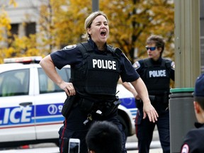 Police set up a perimeter near Parliament Hill in Ottawa on Wednesday Oct. 22, 2014. Errol McGihon/Ottawa Sun/QMI Agency