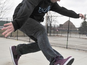 Jesse Cooper, 19, does a few tricks on a skateboard at Tecumseh Park in Sarnia, Ont. (Observer file photo)