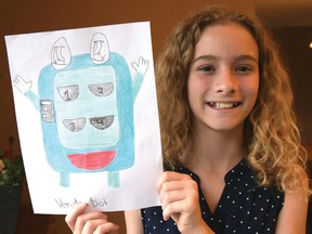 Hannah Hopkins with her toy idea, Vendo-bot.