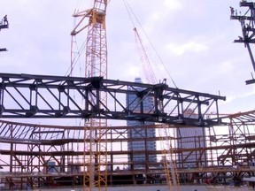 Rogers Place truss lift. (http://www.rogersplace.com/raising-the-roof-rogers-place-box-truss-lift-q-a/)