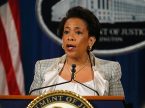 U.S. Attorney General Loretta Lynch holds a news conference, where she announced a federal civil rights investigation into the legality of the Baltimore's police department's use of force and whether there are "systemic violations" as well as any pattern of discriminatory policing, at the U.S. Justice Department in Washington May 8, 2015. REUTERS/Jim Bourg