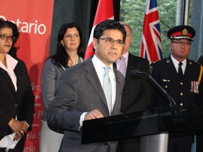 Community Safety Minister Yasir Naqvi announces legislation on Wednesday, June 3, 2015 to establish standards for police record checks. (Toronto Sun/Antonella Artuso)