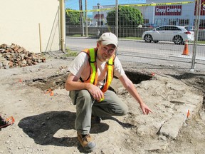 An archeological dig on Barrack Street has uncovered the remains of a 19th-century stone house beneath a parking lot. Jeff Earl, the project’s archeological consultant, said the team tested the parking lot in April for remnants of an early residence or deposits related to Fort Frontenac. (Sebastian Leck/For The Whig-Standard)