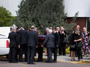 Pallbearers carry the casket of Jason-George Costouros at Beulah Alliance Church in Edmonton, Alberta on Wednesday June 3, 2015. Perry Mah/Edmonton Sun